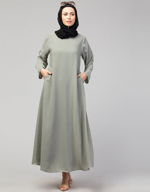 Dubai Abaya with front opening and hidden placket for everyday wear in Color  Sage Green
